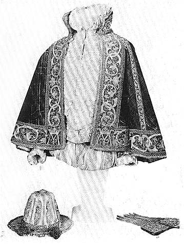 Pánský oděv - červený sametový plášť,  dublet, krátké kalhoty, kožený klobouk a rukavice (1575). Uložen v Londýnském muzeu
